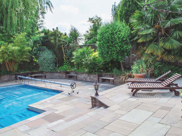 Bronte Indian Sandstone Paving surrounding a swimming pool