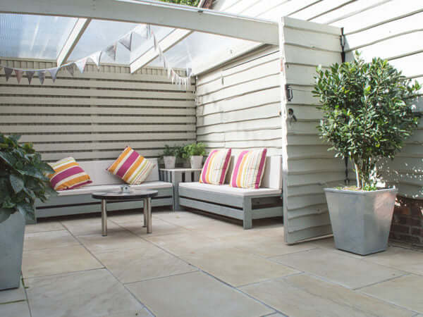 Sawn mint sandstone paving with patio set