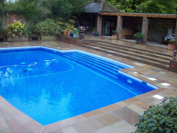 Bronte Indian Sandstone Paving around a swimming pool