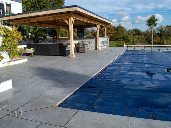 Porcelain Paving surrounding a swimming pool in Hampshire